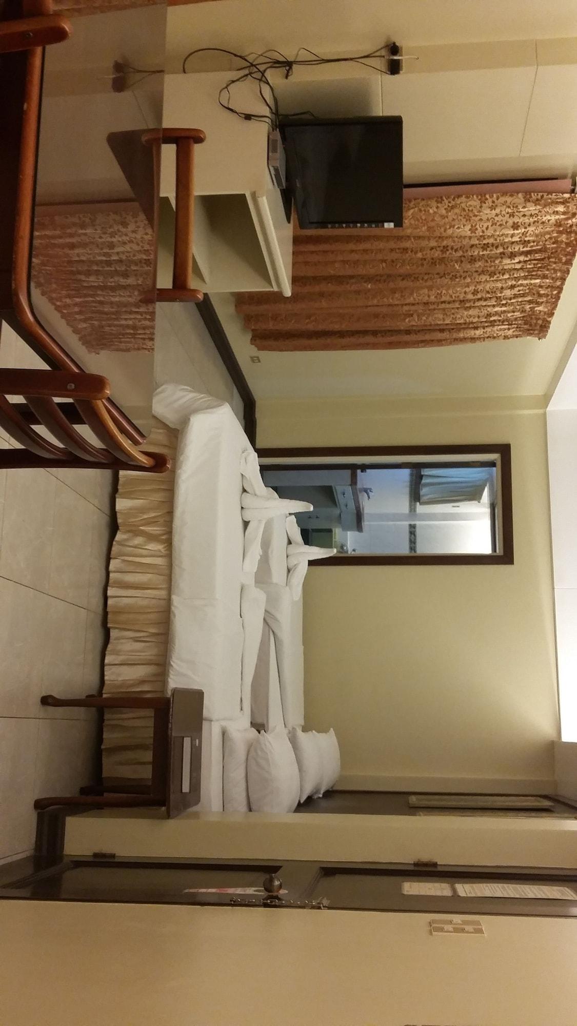Dumaguete Royal Suite Inn Dumaguete City Exterior photo